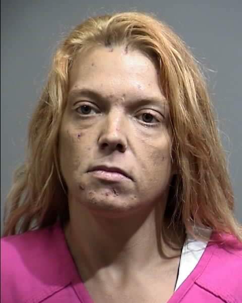 Woman charged with robberies