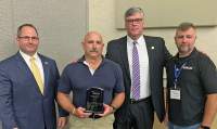 Sgt. Richard Branche, second from left, received the Trainer of the Year award from the S.C. Training Officer’s Association Tuesday in Myrtle Beach. Assisting with the presentation were, from left, Neil Johnson, director of the Georgetown County Detention Center, Carter Weaver, Sheriff of Georgetown County, and Lt. Joshua Solomon of the York County Sheriff’s Office, president of the association.