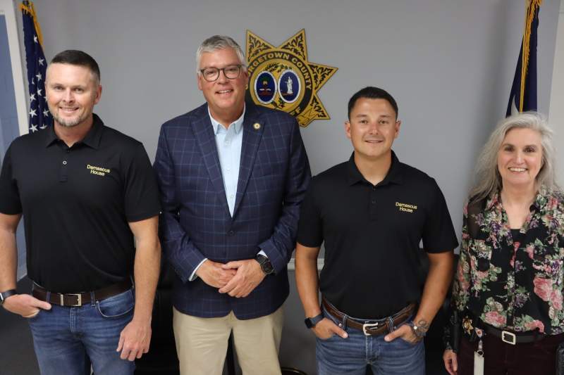 Sheriff Carter Weaver stands with Detention Center Chaplain Deborah Coppedge and Damascus House Program Leaders Vic Wilson and Dillon Dowler.