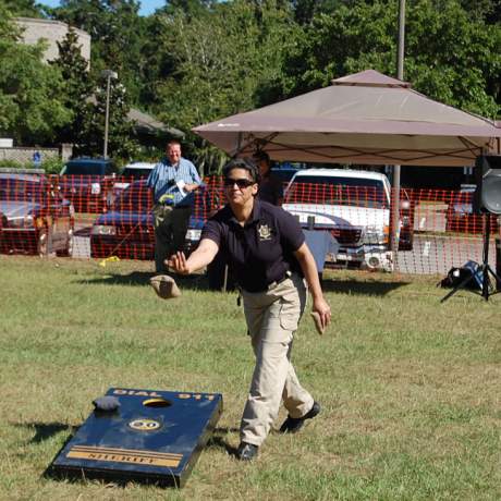 Deputy playing an outdoor wholly board game